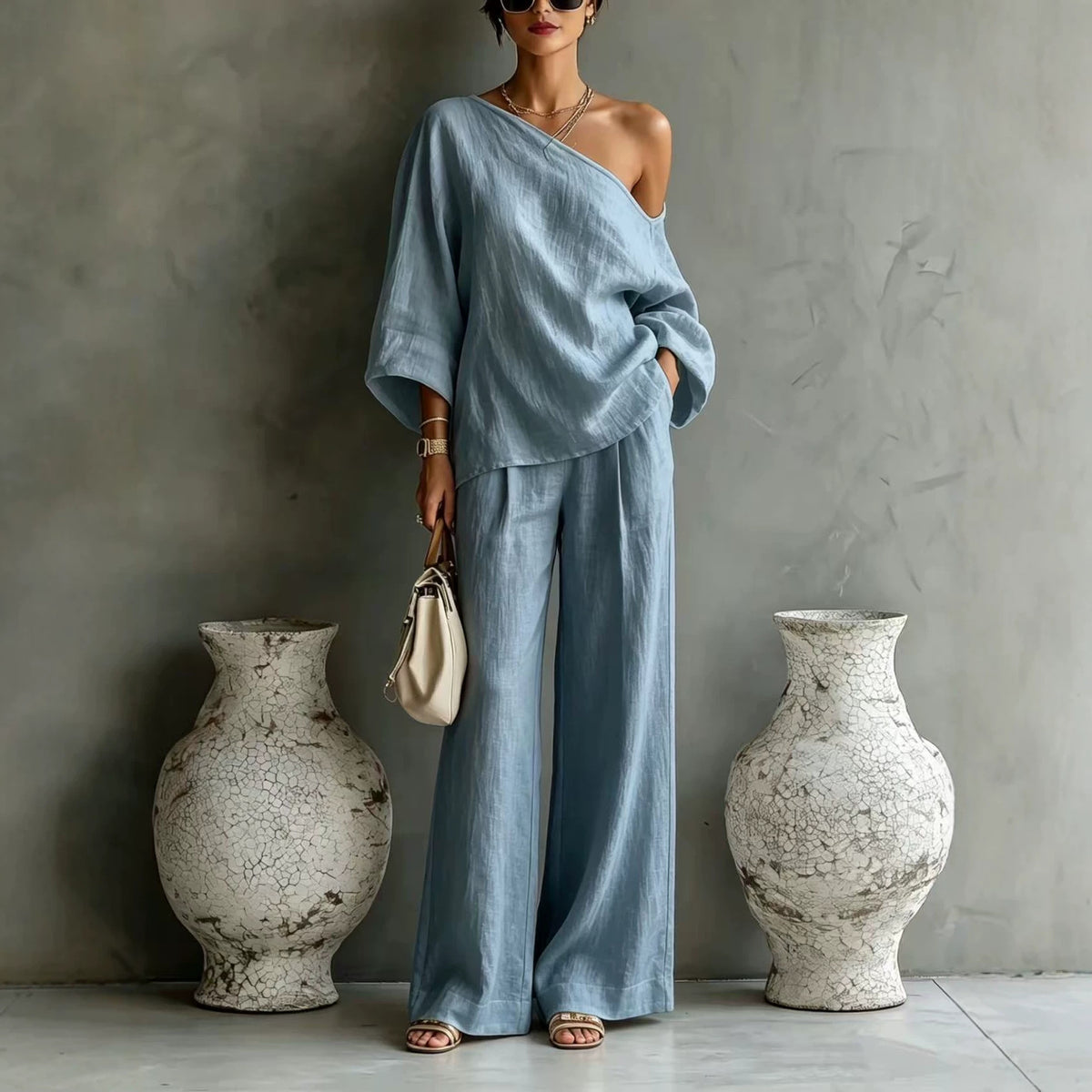 Elegant Off-shoulder Top And Loose Wide-leg Pants Set In A Relaxed, Laid-back Style