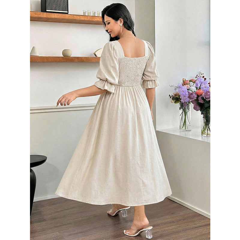 Long Short-sleeved Dress With Bubble Sleeves A Fitted Waist And A Slimming Midi Length