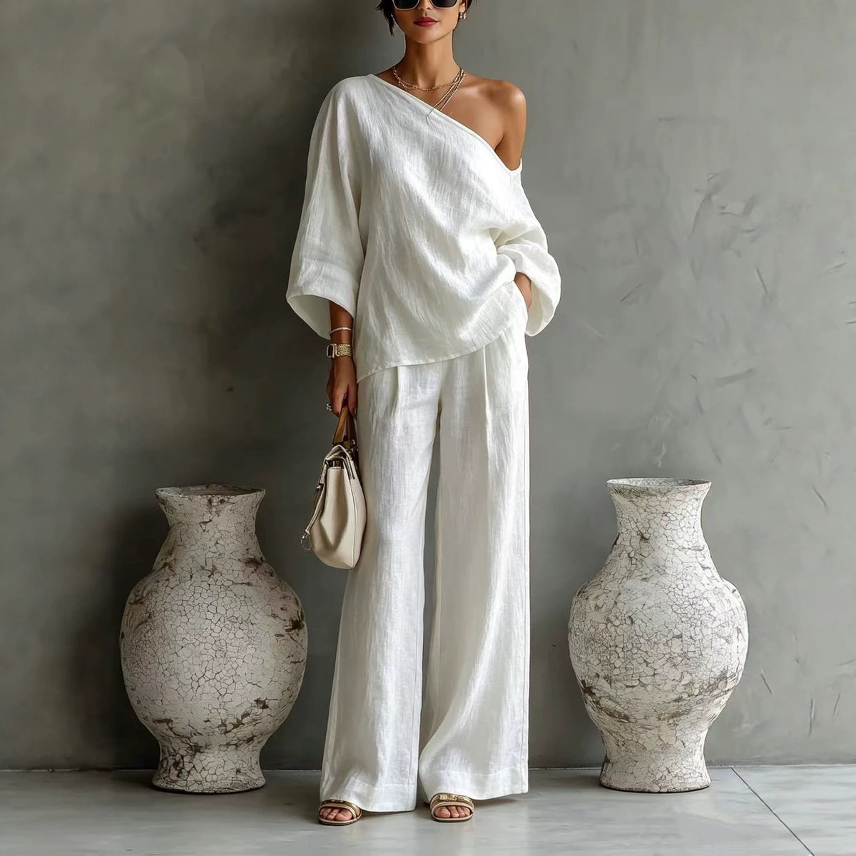 Elegant Off-shoulder Top And Loose Wide-leg Pants Set In A Relaxed, Laid-back Style
