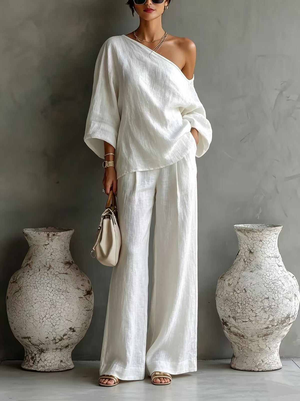 Elegant Off-shoulder Top And Loose Wide-leg Pants Set In A Relaxed, Laid-back Style