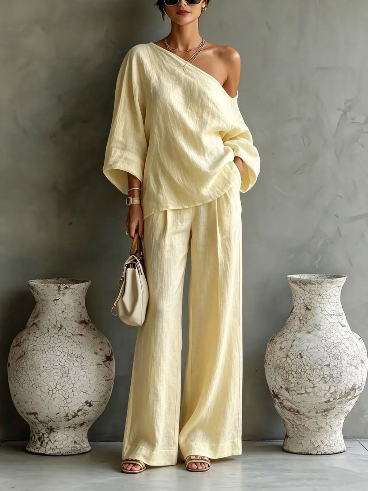 Elegant Off-shoulder Top And Loose Wide-leg Pants Set In A Relaxed, Laid-back Style
